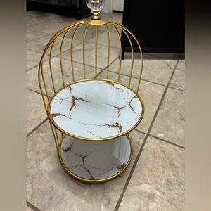 Beautiful bird cage makeup, skincare and jewelry display